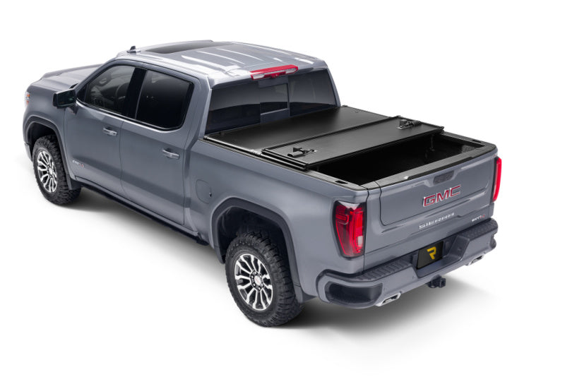 UnderCover 05-21 Nissan Frontier 5ft w/ Factory Cargo Management System Triad Bed Cover