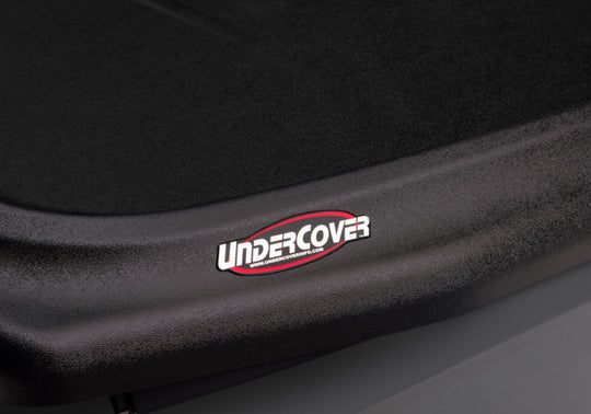 UnderCover 05-15 Toyota Tacoma 6ft SE Bed Cover - Black Textured (Req Factory Deck Rails)