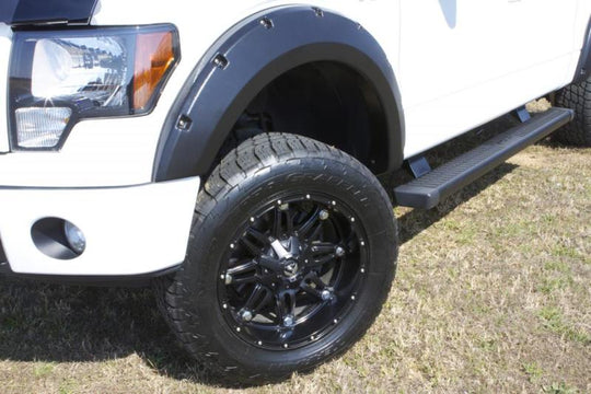 Lund 16-17 Toyota Tacoma RX-Rivet Style Textured Elite Series Fender Flares - Black (2 Pc.)