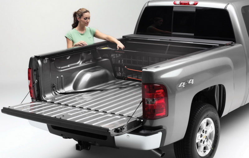 Roll-N-Lock 99-07 Chevy Silverado/Sierra w/ OE Rail Caps SB 77-3/4in Cargo Manager