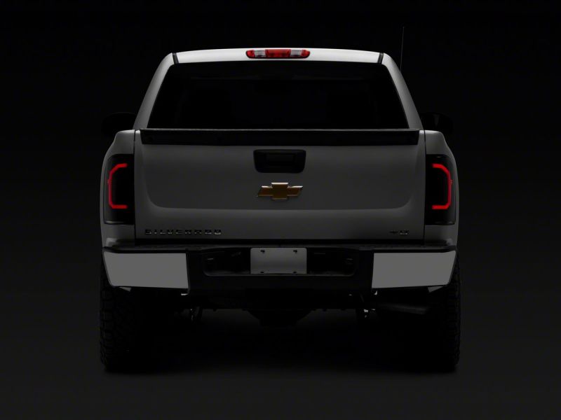 Raxiom 07-14 Chevrolet Silverado 1500 Axial Series LED Tail Lights- Blk Housing (Smoked Lens)