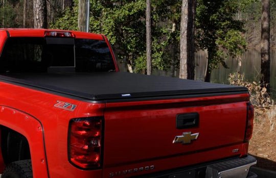 Lund 04-06 Chevy Silverado 1500 Fleetside (5.8ft. Bed) Hard Fold Tonneau Cover - Black