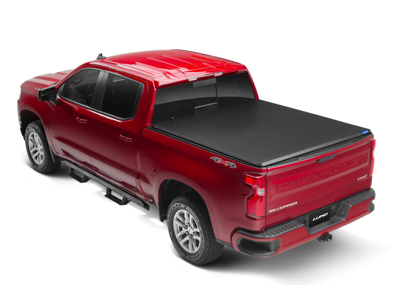 Lund 05-15 Toyota Tacoma Fleetside (5ft. Bed) Hard Fold Tonneau Cover - Black