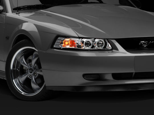 Raxiom 99-04 Ford Mustang Dual LED Halo Projector Headlights- Chrome Housing (Clear Lens)