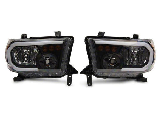 Raxiom 07-13 Toyota Tundra Axial Series Headlights w/ LED Bar- Blk Housing (Clear Lens)