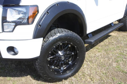 Lund 99-10 Ford F-250 RX-Rivet Style Smooth Elite Series Fender Flares - Black (2 Pc.)