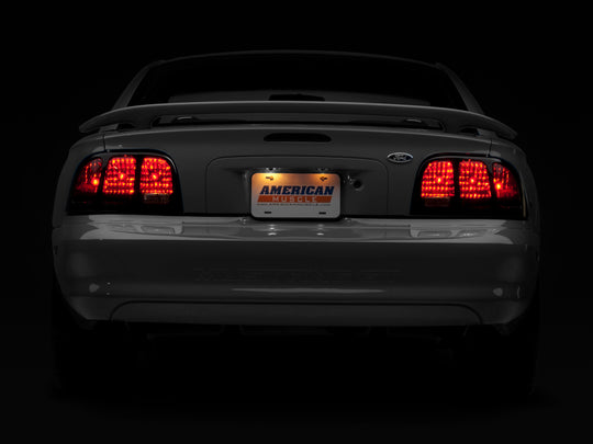 Raxiom 96-98 Ford Mustang Tail Lights- Black Housing (Smoked Lens)