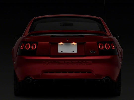 Raxiom 99-04 Ford Mustang Axial Series Altezza Style Tail Lights- Blk Housing (Smoked Lens)