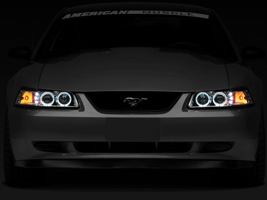 Raxiom 99-04 Ford Mustang Dual LED Halo Projector Headlights- Chrome Housing (Clear Lens)