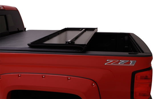 Lund 05-15 Toyota Tacoma Fleetside (5ft. Bed) Hard Fold Tonneau Cover - Black