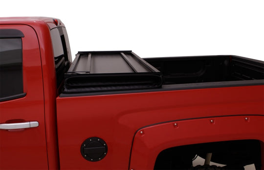 Lund 04-06 Chevy Silverado 1500 Fleetside (5.8ft. Bed) Hard Fold Tonneau Cover - Black