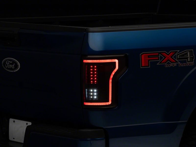 Raxiom 15-17 Ford F-150 LED Tail Lights w/ SEQL Turn Signals- Blk Housing (Clear Lens)