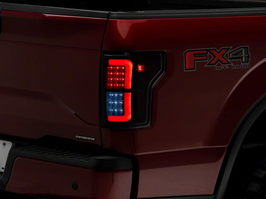 Raxiom 15-17 Ford F-150 Axial Series LED Tail Lights- Blk Housing (Smoked Lens)