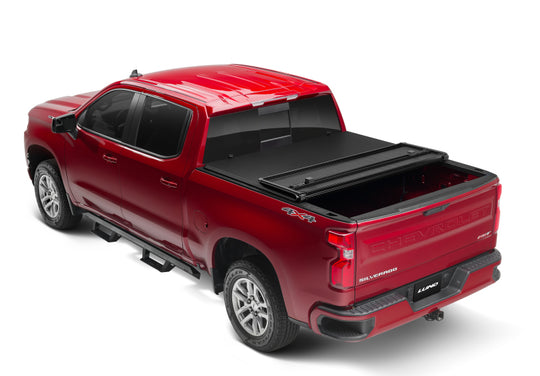 Lund 07-13 Toyota Tundra Fleetside (8ft. Bed) Hard Fold Tonneau Cover - Black