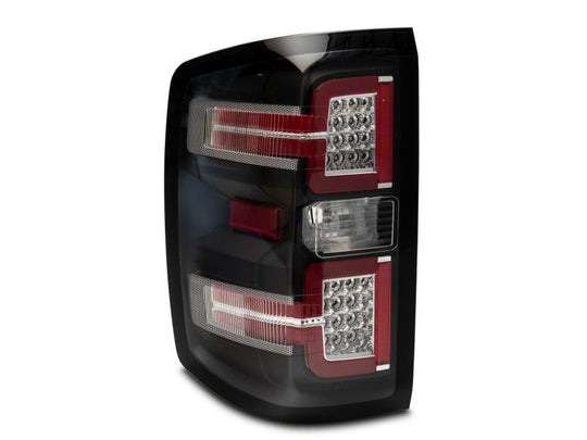 Raxiom 14-18 Chevrolet Silverado 1500 LED Taillights w/ SEQL Turn Signals- Blk Housing (Clear Lens)