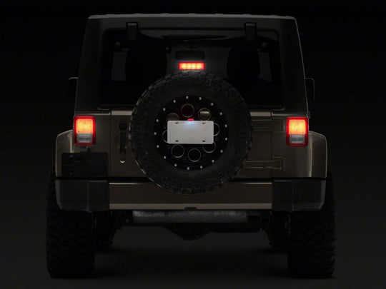 Raxiom 07-18 Jeep Wrangler JK Axial Series License Plate Bracket w/ LED Brake Light